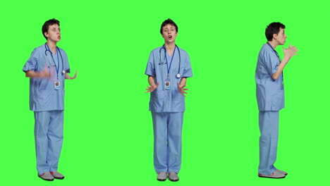 Stressed-furious-nurse-screaming-at-someone-against-greenscreen-backdrop